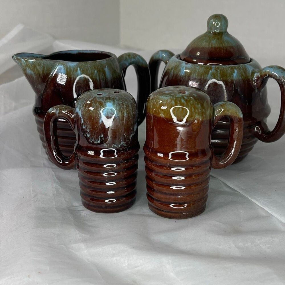 Vintage brown blue drip glaze creamer sugar salt & pepper set.